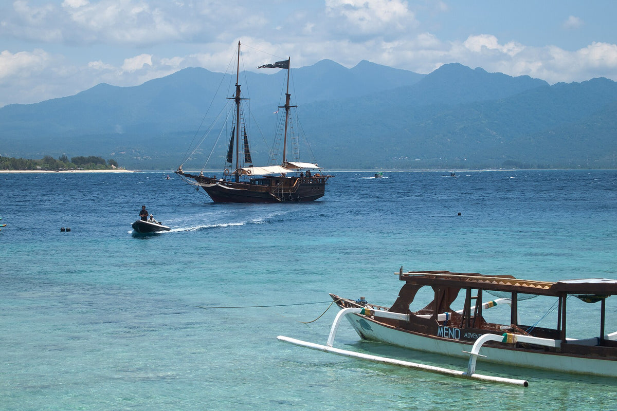 Boats off Gili Meno with Lombok and Mount Rinjani in the distance