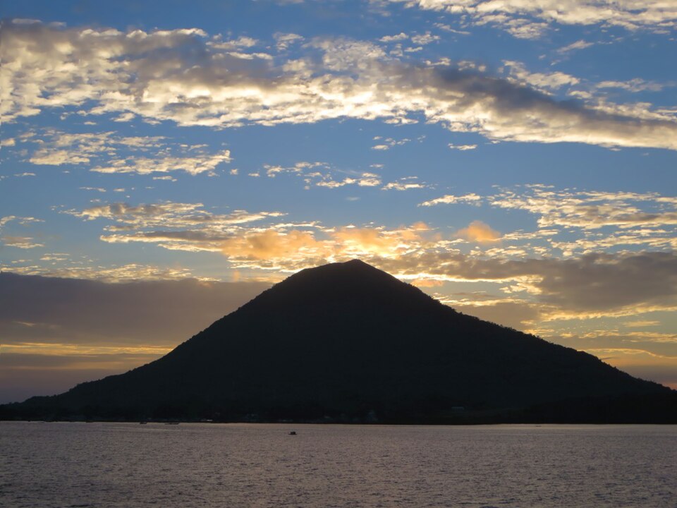 Silhouette of Gunung Api volcano at sunset, Banda Neira