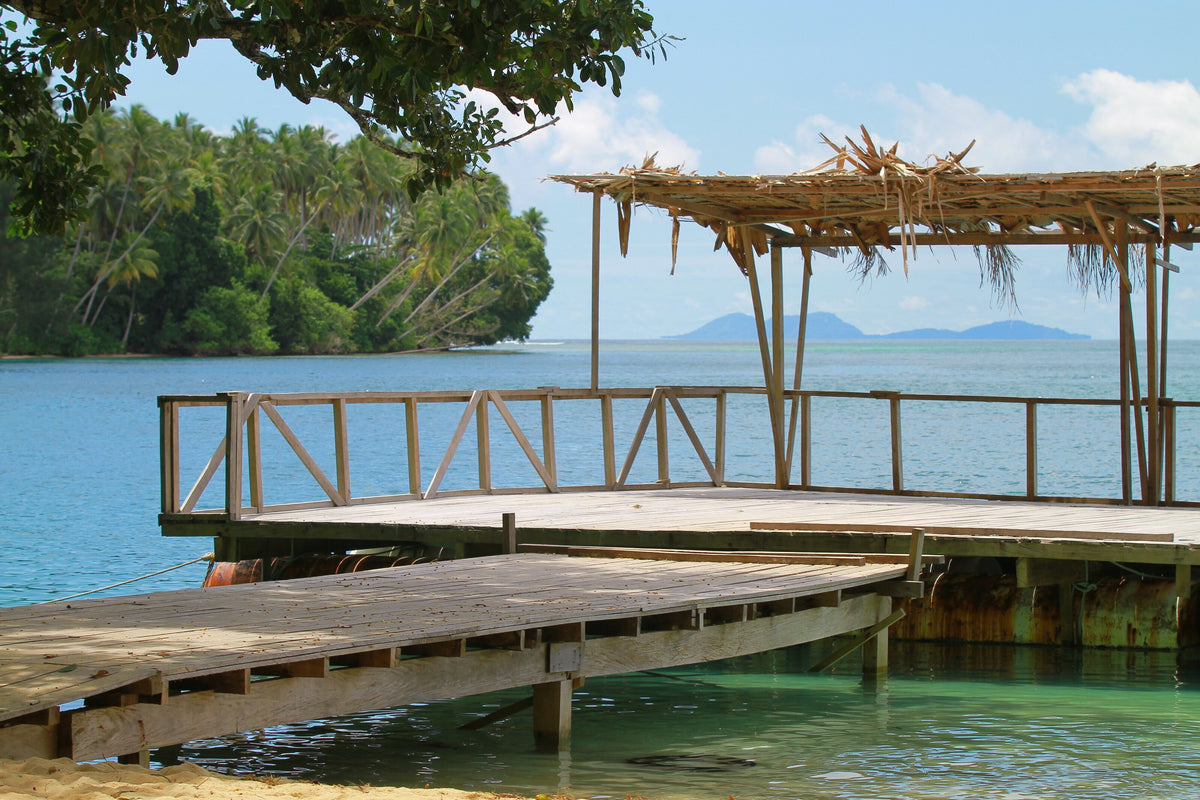 Sheltered floating jetty beside a village on Gizo Island, Solomon Islands
