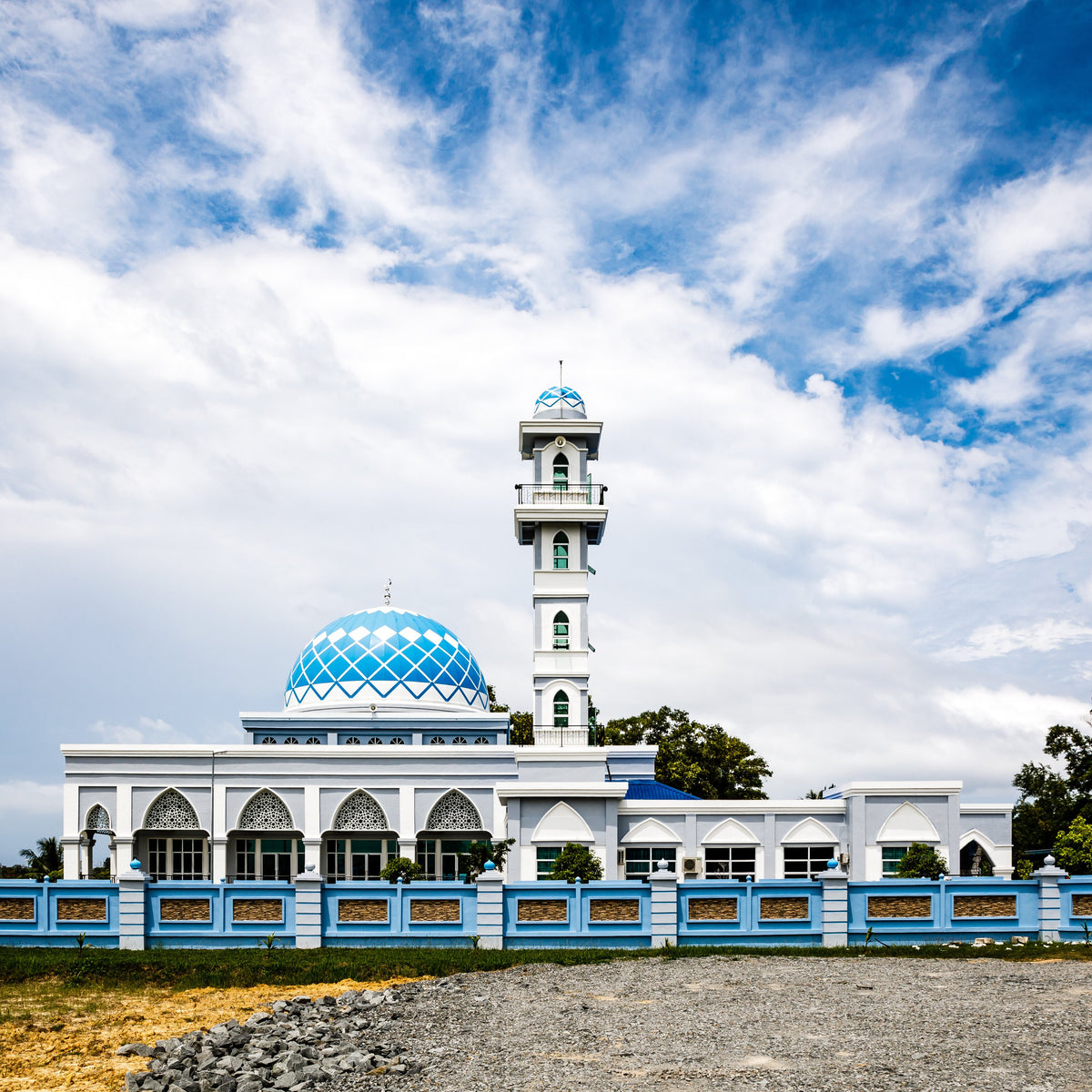Blue domes and minaret of Al-Mahmudiyyah Mosque on Labuan Island, Malaysia