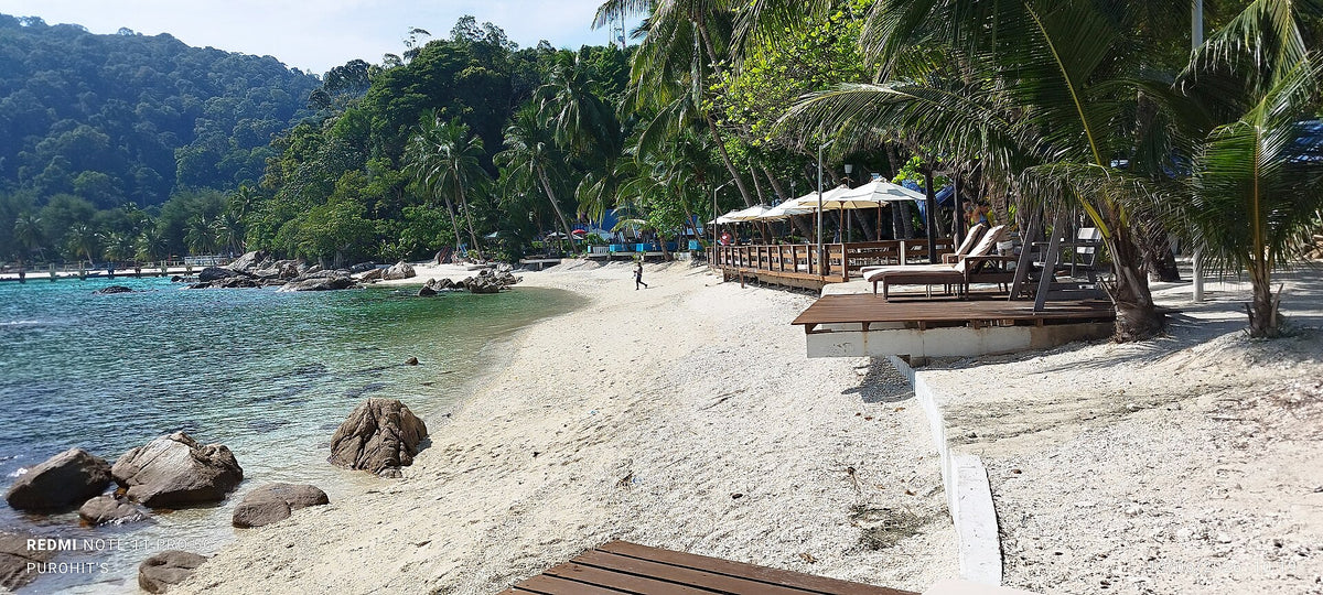 Sheltered beach backed by forest in the Perhentian Islands