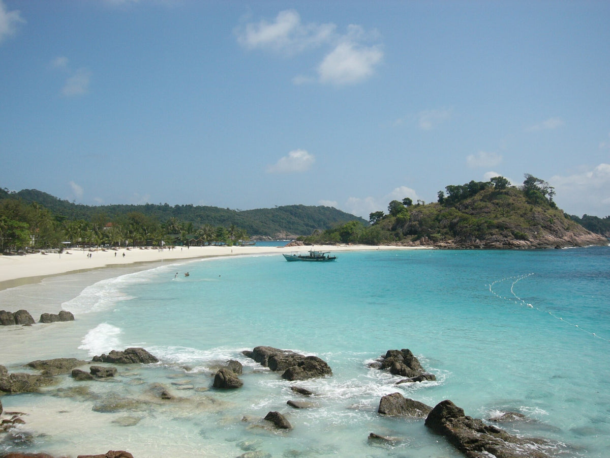 Rocky shoreline overlooking Pasir Panjang bay on Redang Island